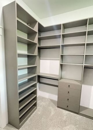 Virginia Beach – Custom closet – Gray walk-in closet with corner shelving and storage drawers