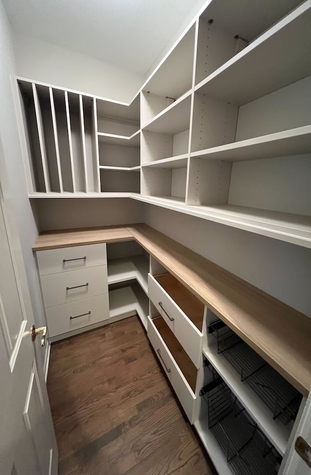 Custom Pantry with a Butcher Block countertop and shelves for storage in Novi, Michigan