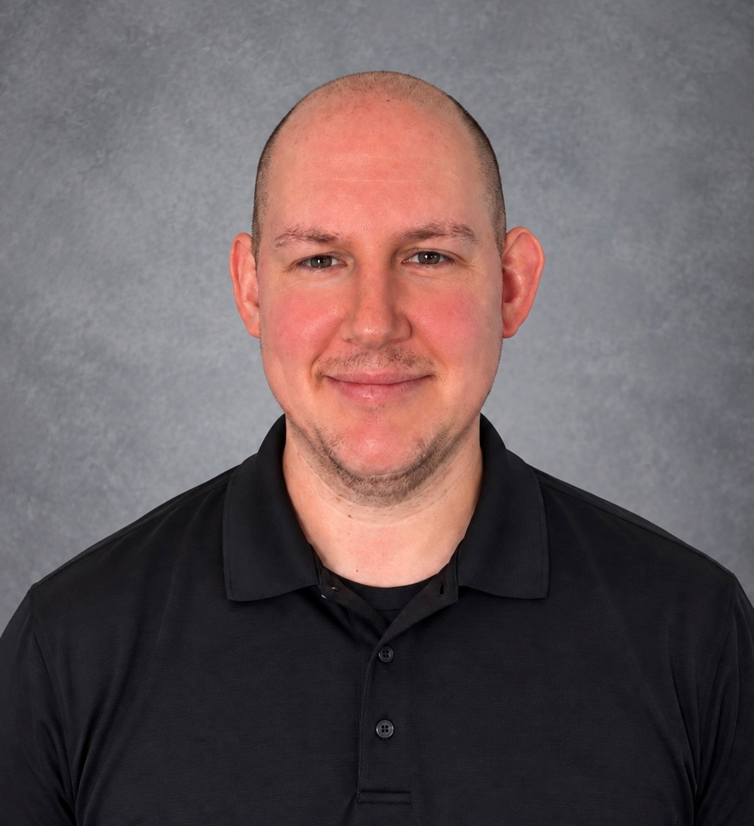 Photo of Adam Simmons