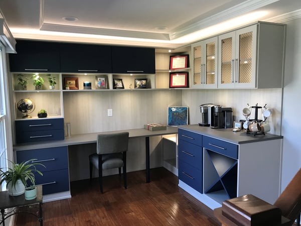 A Suite Hardware Office with fixed lighting and a variety of different finishes including Deep Pond, Morning Light, and Misty Orchard by California Closets Columbus.