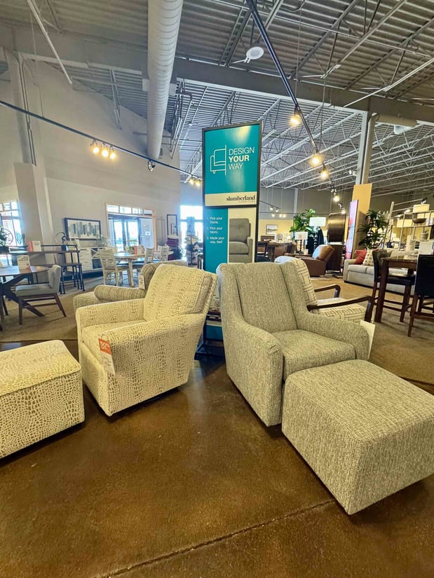 Rockford Slumberland Furniture white chairs with ottomans