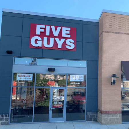Photo of the entrance to the Five Guys restaurant at 2490 Market St. NE in Washington, DC.