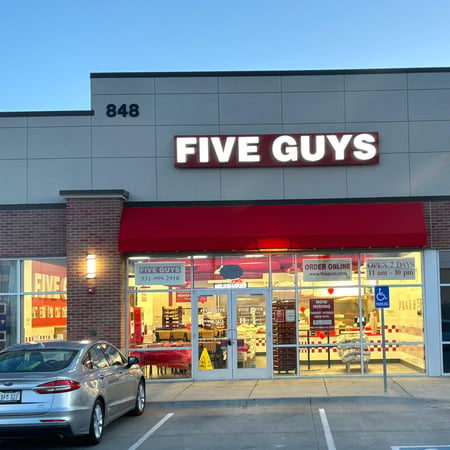 Exterior photograph of the Five Guys restaurant at 848 Cornhusker Road in Bellevue, Nebraska.