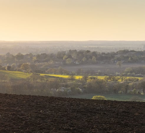 The sun setting over Kidlington and the farming landscape of the Cherwell district of Oxfordshire.