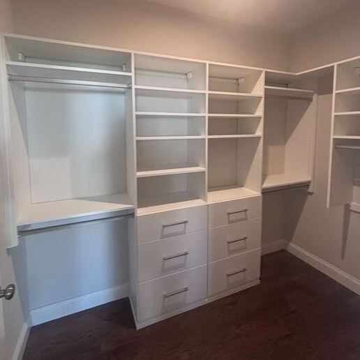 Richmond - Custom closets - custom closet system with hanging rods, drawers, and open shelving arranged along the walls