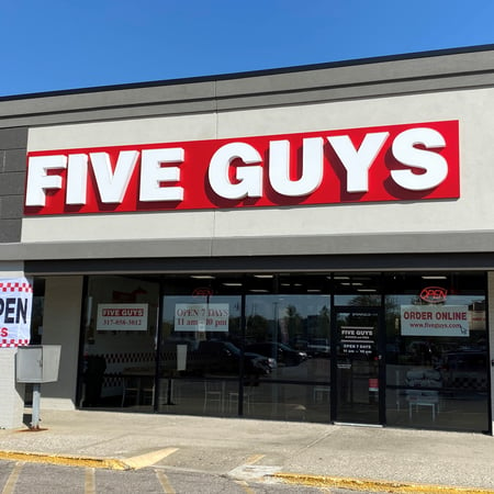 Exterior photograph of the Five Guys restaurant at 124 East Northfield Drive in Brownsburg, Indiana.