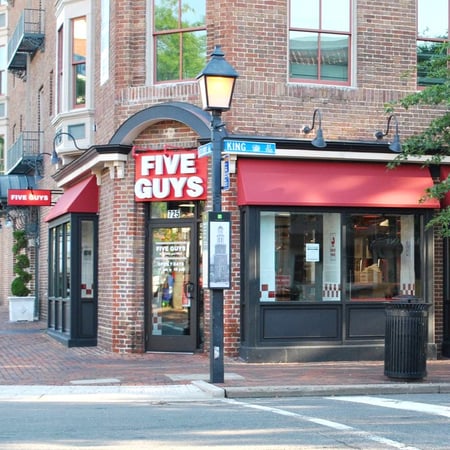 Store front of the Five Guys at 725 King Street in Alexandria, VA.