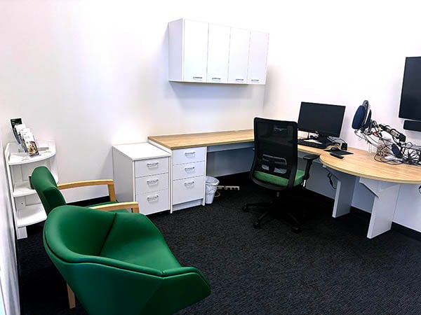 Interior photo of the consultation office in the AudioNova hearing clinic in Downers Grove, IL