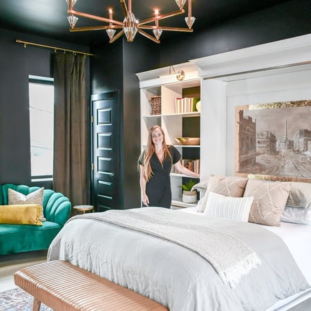 Custom Murphy bed wall system with built-in storage, shelving, and lighting. California Closets Greater Detroit