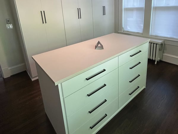 Greensboro - Custom closets - walk-in closet with floor-to-ceiling cabinet doors and a center island for extra storage