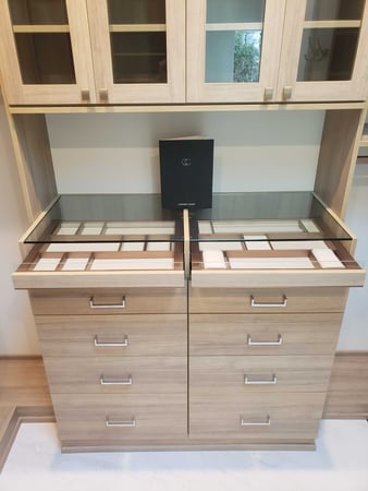 Custom Tan closet shelving with jewelry drawer for accessories by California Closets San Diego, California.
