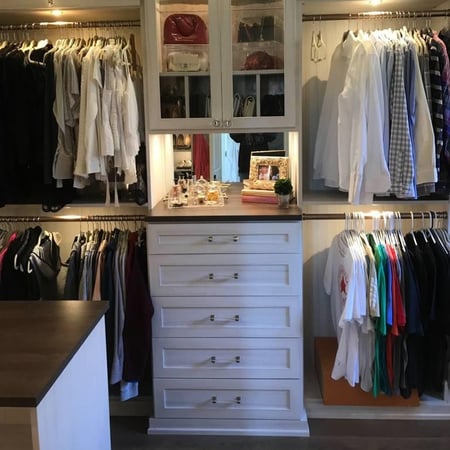Greensboro - Custom closets - Walk-in closet with a center island, drawers, and glass cabinets