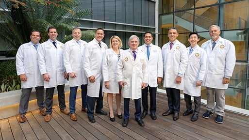 image: a team of neurologists doctors in white lab coats