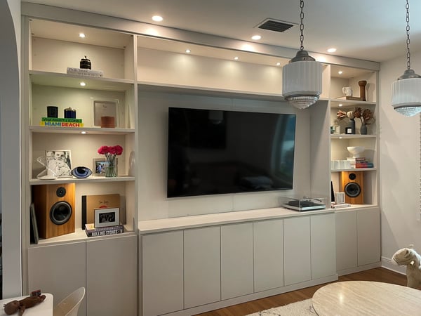 Media Center with open shelving with some bottom hidden cabinets for those more valuable items.