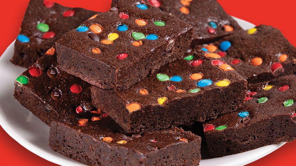 crunchy-sweet M&M'S® MINIS on top of a chocolatey fudge brownie