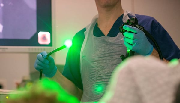 Endoscopist with an endoscopy scope green light