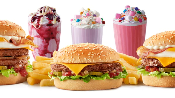 Three Wimpy Burgers and Wimpy Famous Shakes on a white background