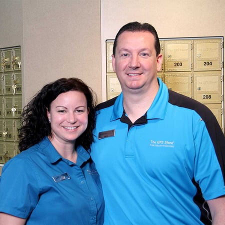 Husband and wife store associates store owners