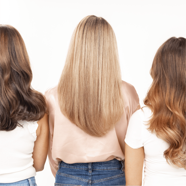 Three women showing off their newly colored hair from Hair Cuttery