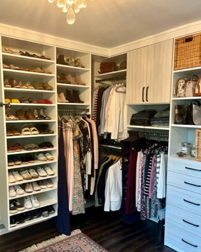 Richmond - Custom closets - Organized walk-in closet with shoe shelves, drawers, and a cabinet