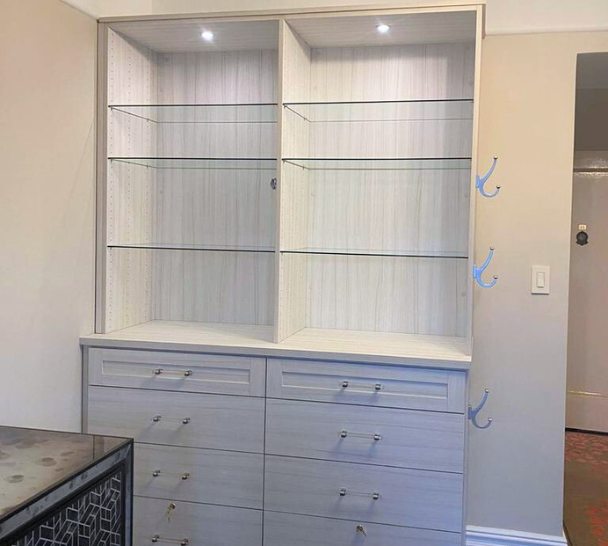 California Closets Long Island City NY built in closets custom wardrobe unit glass shelving closet lighting storage ideas for closets closet drawer organizer closet organization custom cabinets luxury