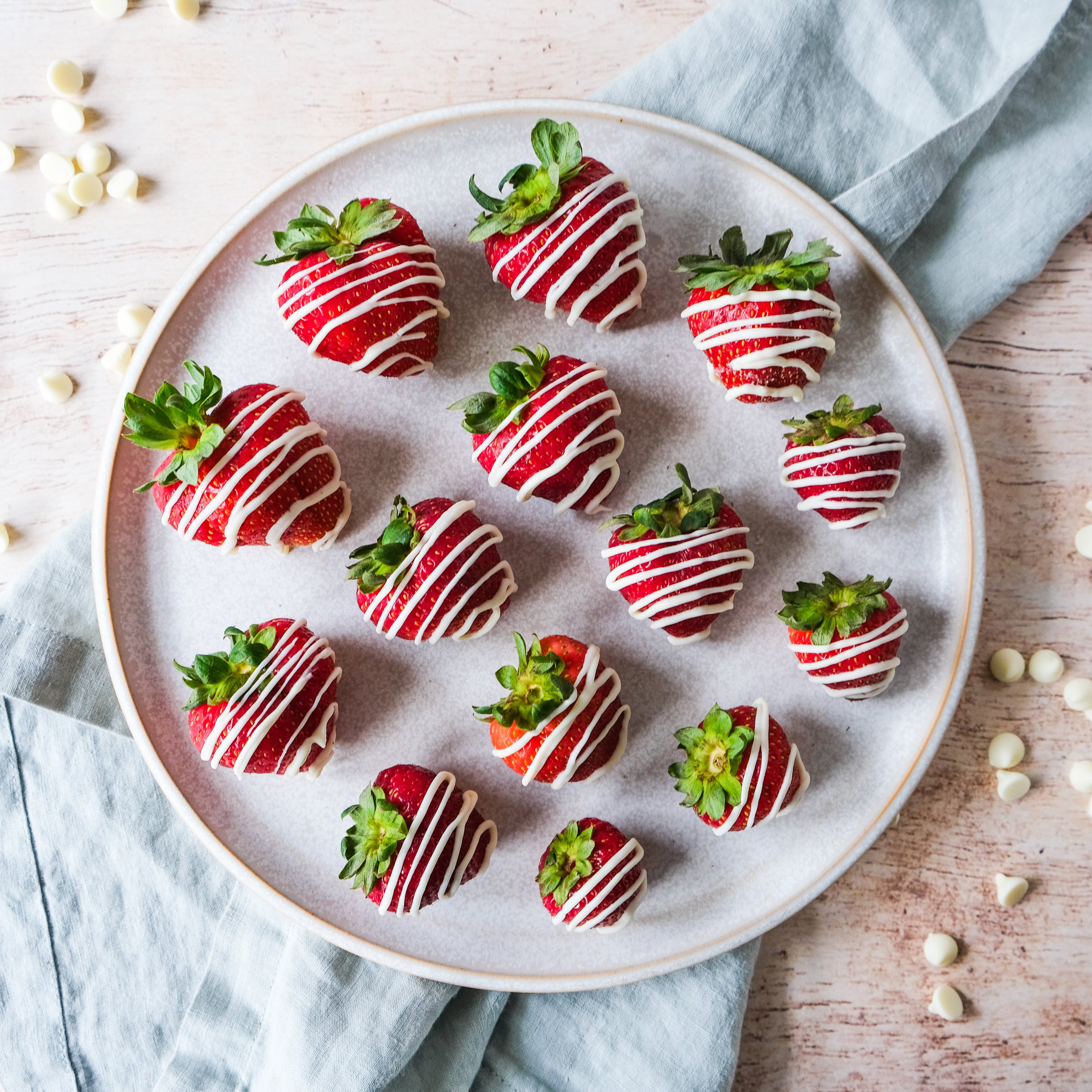 strawberries with white chocolate drizzle