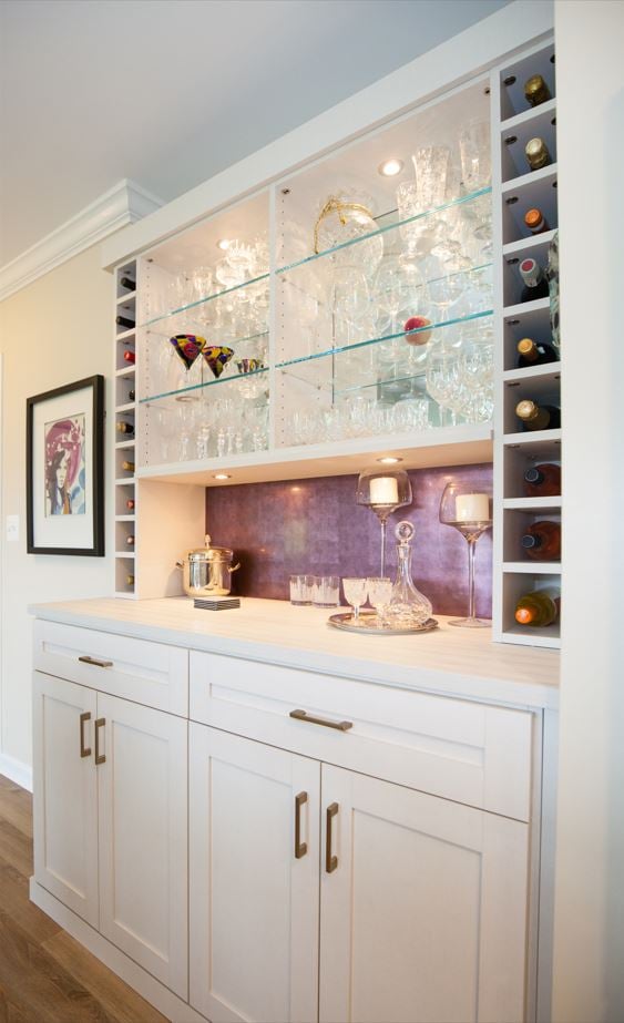 Custom Wine Bar with Accent, Metal Backing, Wine Cubbies, Glass Shelves, and Puck Lighting in Glen Mills, PA