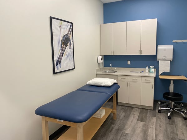 MA-Norwood-BSPT inside the patient care room area showing patient tables and equipment.