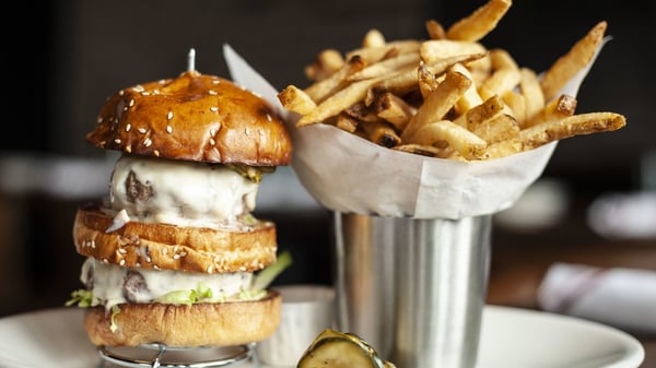 A Signature MAX Premium Burger with a side of hand-cut fries