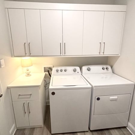 Custom cabinets laundry room  California Closets Gulf Coast & New Orleans