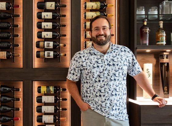 Wine Bar Custom Storage Lit Countertop Brown Woodgrain Finish by California Closets