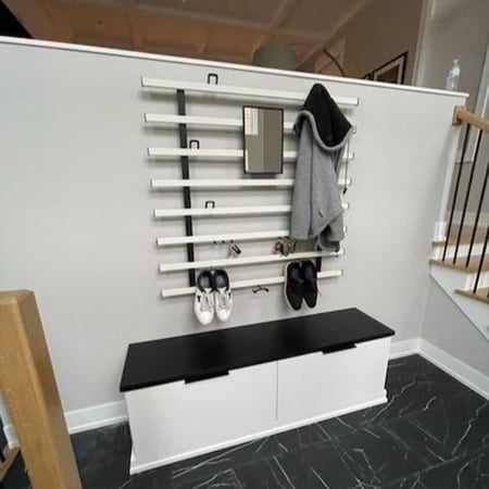 Minimalist entryway design with Maddox system and storage bench