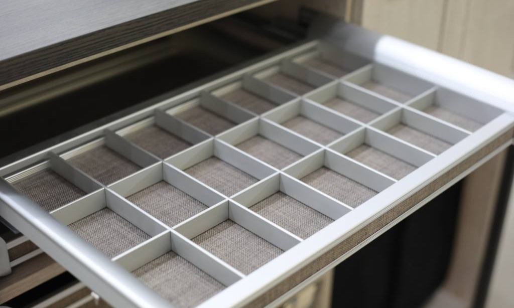 Space-saving drawer organizer by California Closets Raleigh, North Carolina.