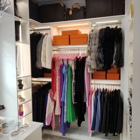 Greensboro - Custom closets - beautifully organized closet with LED lights, organized clothes, boxes, and bags