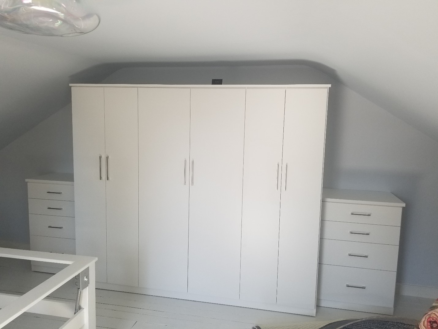 Custom Attic Storage with Doors and Drawers