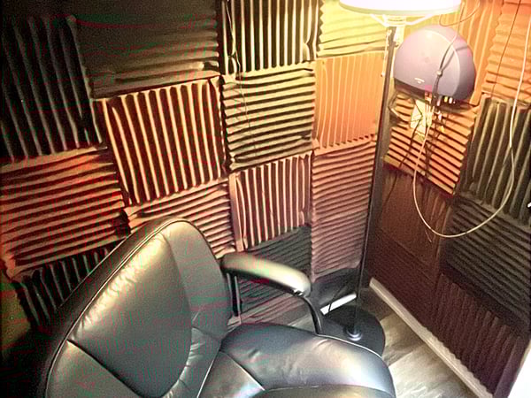 Interior photo of the sound testing booth for the AudioNova hearing clinic in Leesburg, FL on Highway 27