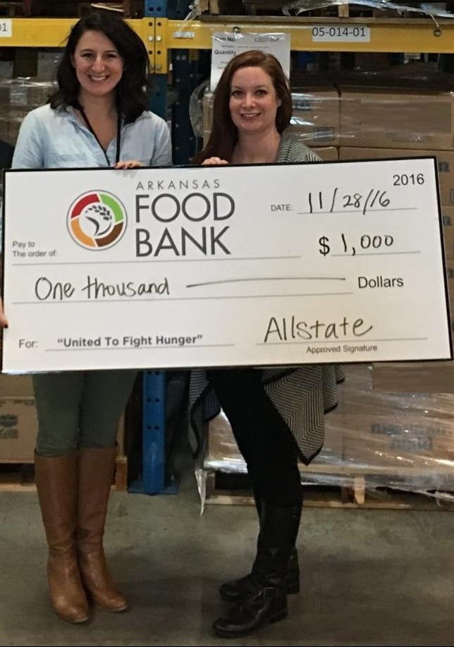 Jennifer King, Allstate Insurance Agent in Little Rock, AR presents check to Arkansas Food Bank.