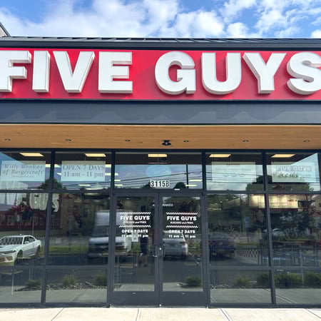 Exterior photograph of the Five Guys restaurant at 3115 NJ-38 in Mt. Laurel, New Jersey.