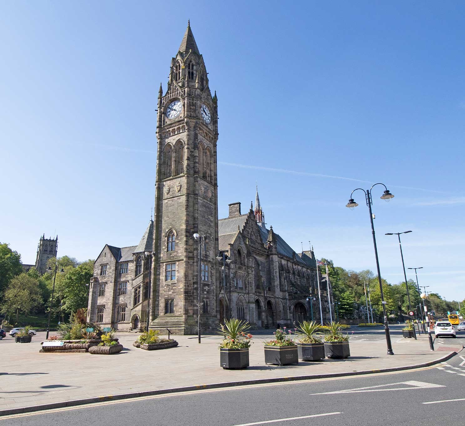View of the Rochdale Town Hall and clocktower in the centre of Rochdale on a bright sunny morning