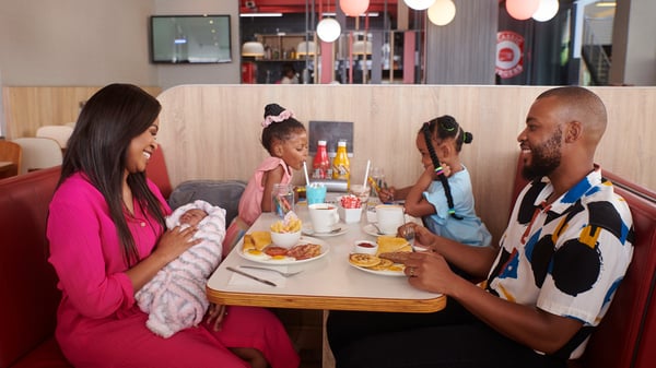 Image of a family at a Wimpy Restaurant.