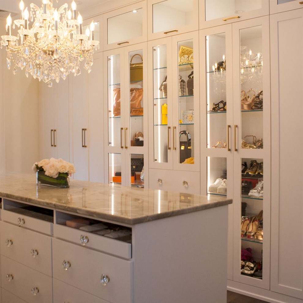 Custom, Built-In Wardrobe with Glass Doors and Shelves, plus Accent Lighting