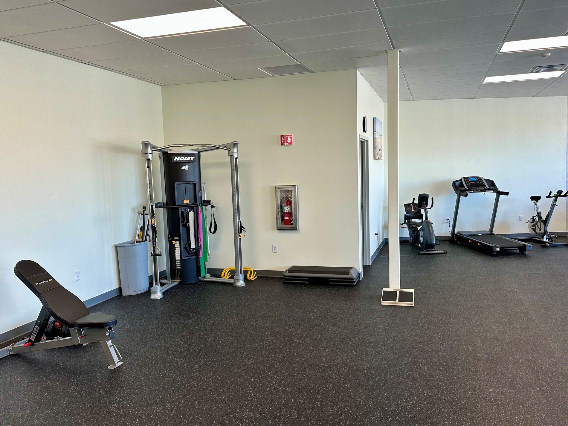 RI-NorthProvidence Bay State Physical Therapy patient care area with PT equipment.