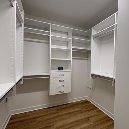 Greensboro - Custom closets - white walk-in closet with racks, shelves, and drawers