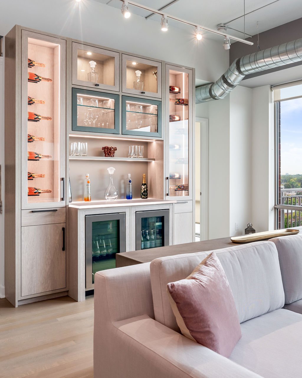 Custom Wine Bar with Lighting, Glass Doors, and Chillers