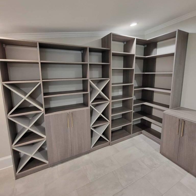 Greensboro - Custom closets - custom pantry featuring gray wood shelving, built-in wine racks, adjustable shelves, and lower cabinets with modern hardware