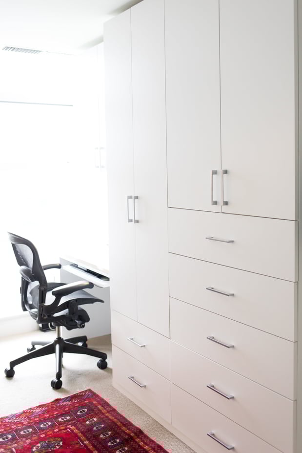 Office storage with flat cabinet door and drawer faces and simple hardware