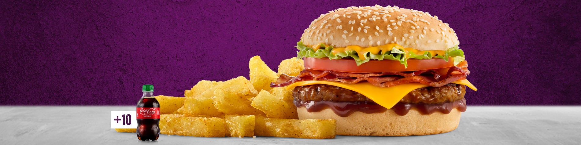 The Bacon & Cheese burger with Chips on a grey surface with a purple background.