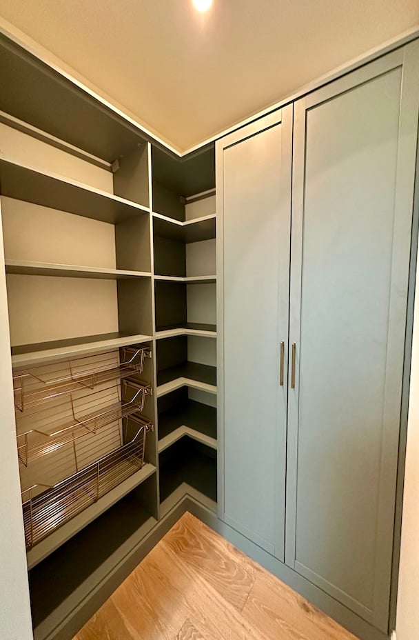 Custom kitchen pantry with pantry cabinets, pantry storage, pantry organization, shelving, and storage solutions in Birmingham, Michigan
