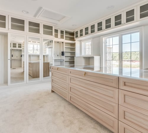 Walk in closet design with custom closets, closet organizers, closet cabinets, drawers, shelving, and hanging storage, Cranbrook Custom Homes by California Closets Greater Detroit