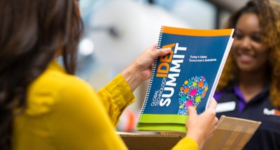 Printed presentation materials bound and ready for a business meeting at FedEx Office.